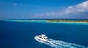 Yacht cruising through the lagoon
