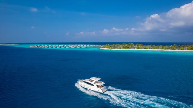 Yacht cruising through the lagoon