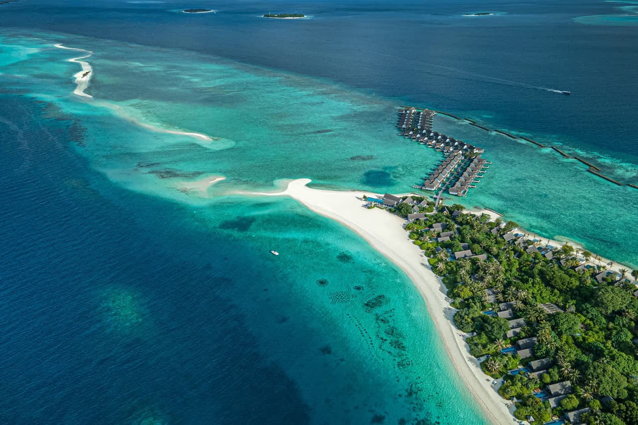 Island and long sandbank, aerial view at Four Seasons Landaa Giraavaru