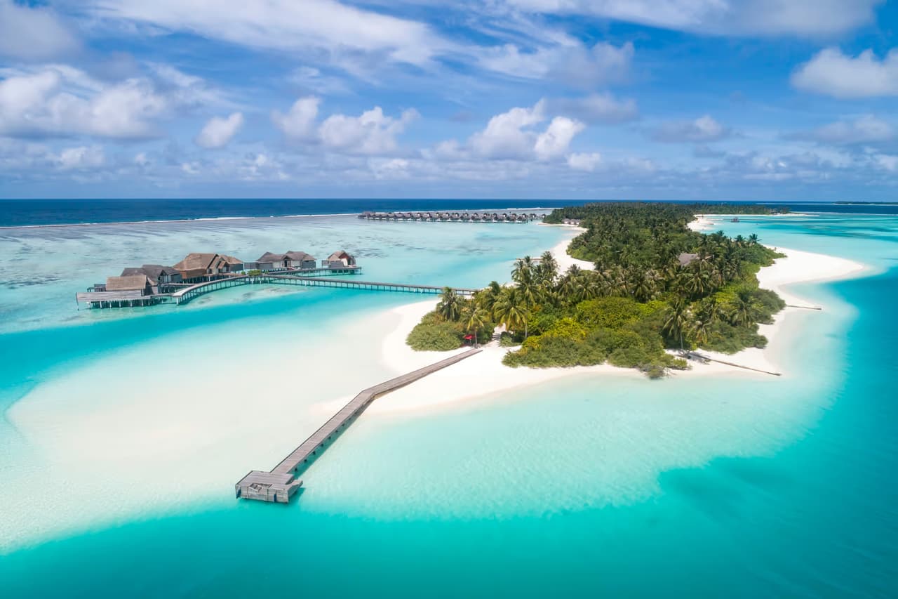 Island, beach and arrival jetty, aerial view at Niyama Private Islands