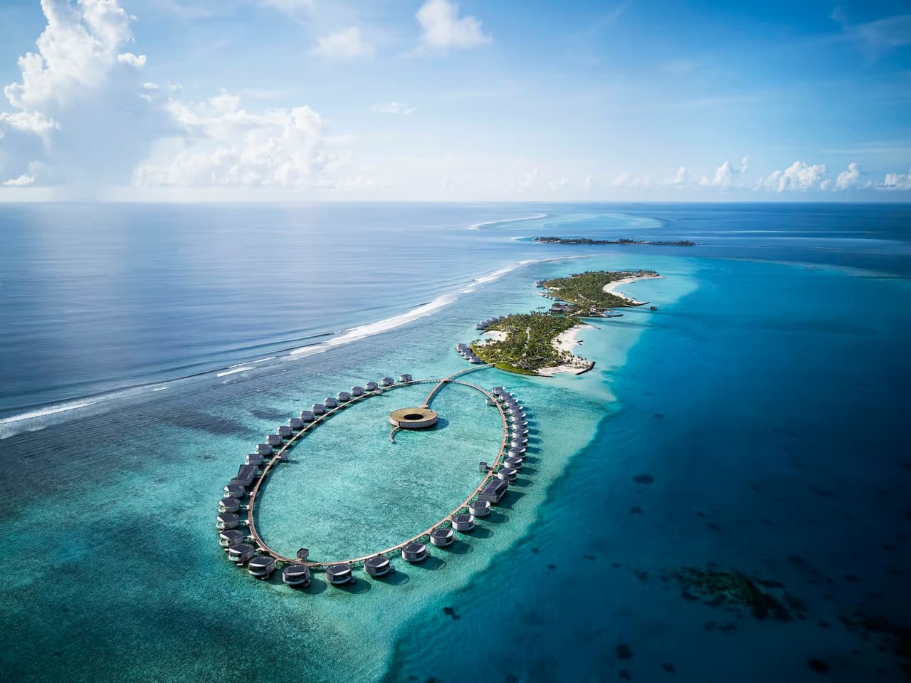 Fari Islands and circular water-villa jetty, aerial view at The Ritz-Carlton Maldives, Fari Islands