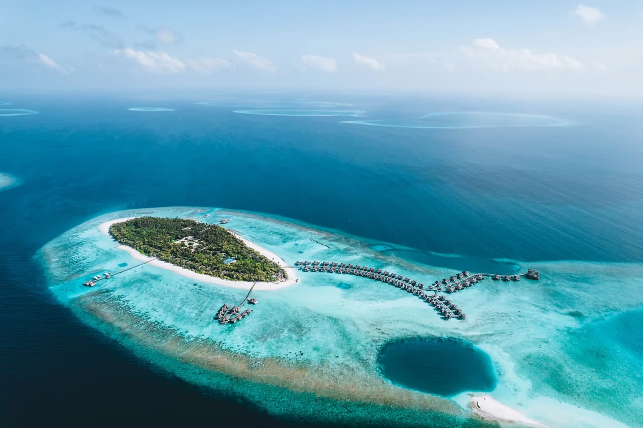 Island and surrounding lagoon, aerial view at Vakkaru Maldives