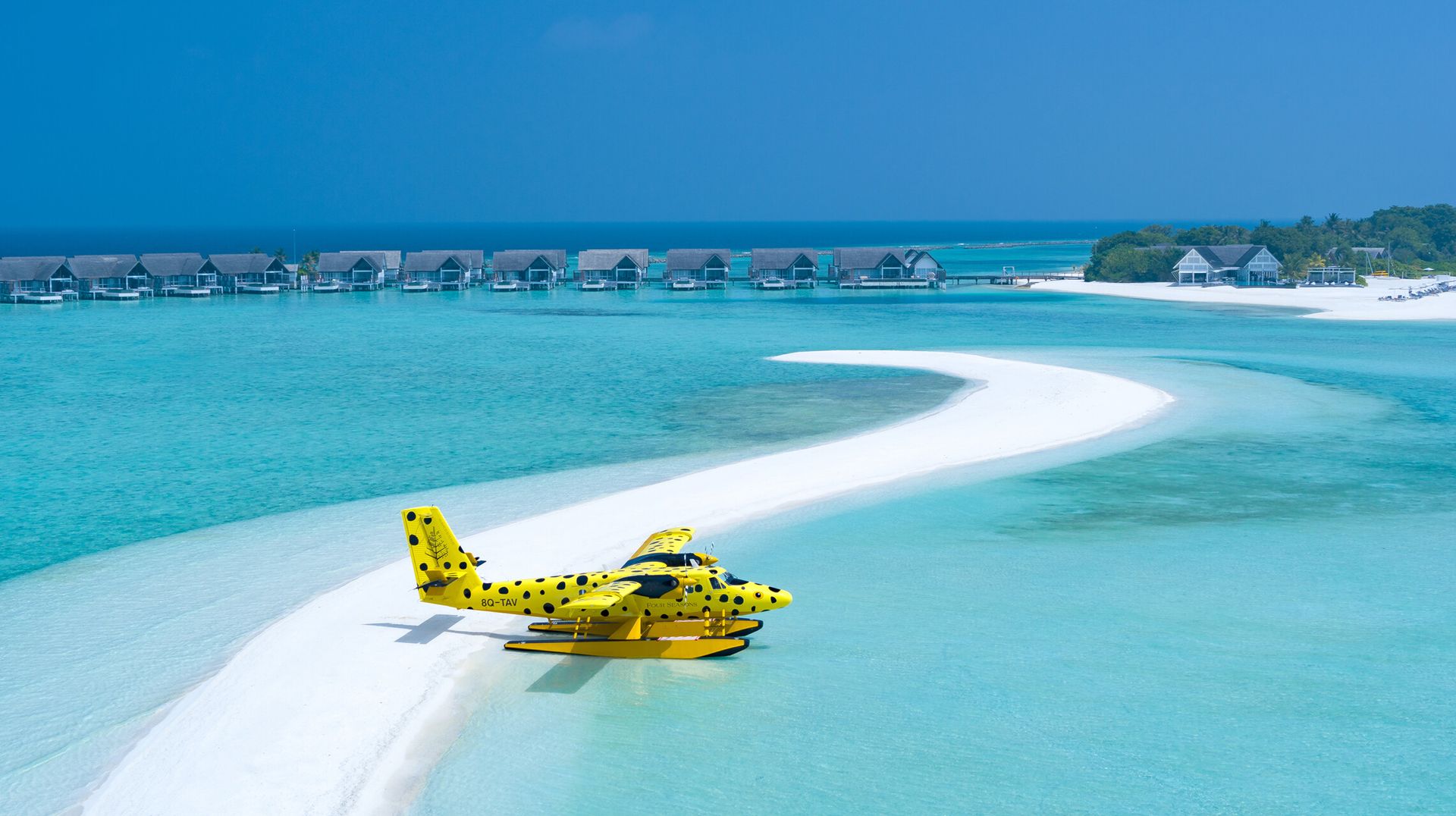 Seaplane beside the sandbank at Four Seasons Landaa Giraavaru