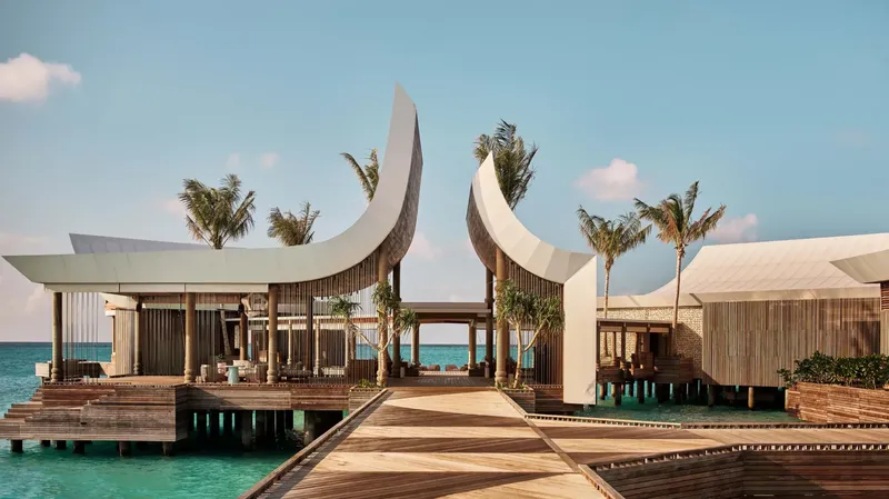Overwater arrival pavilion at .Here Baa Atoll