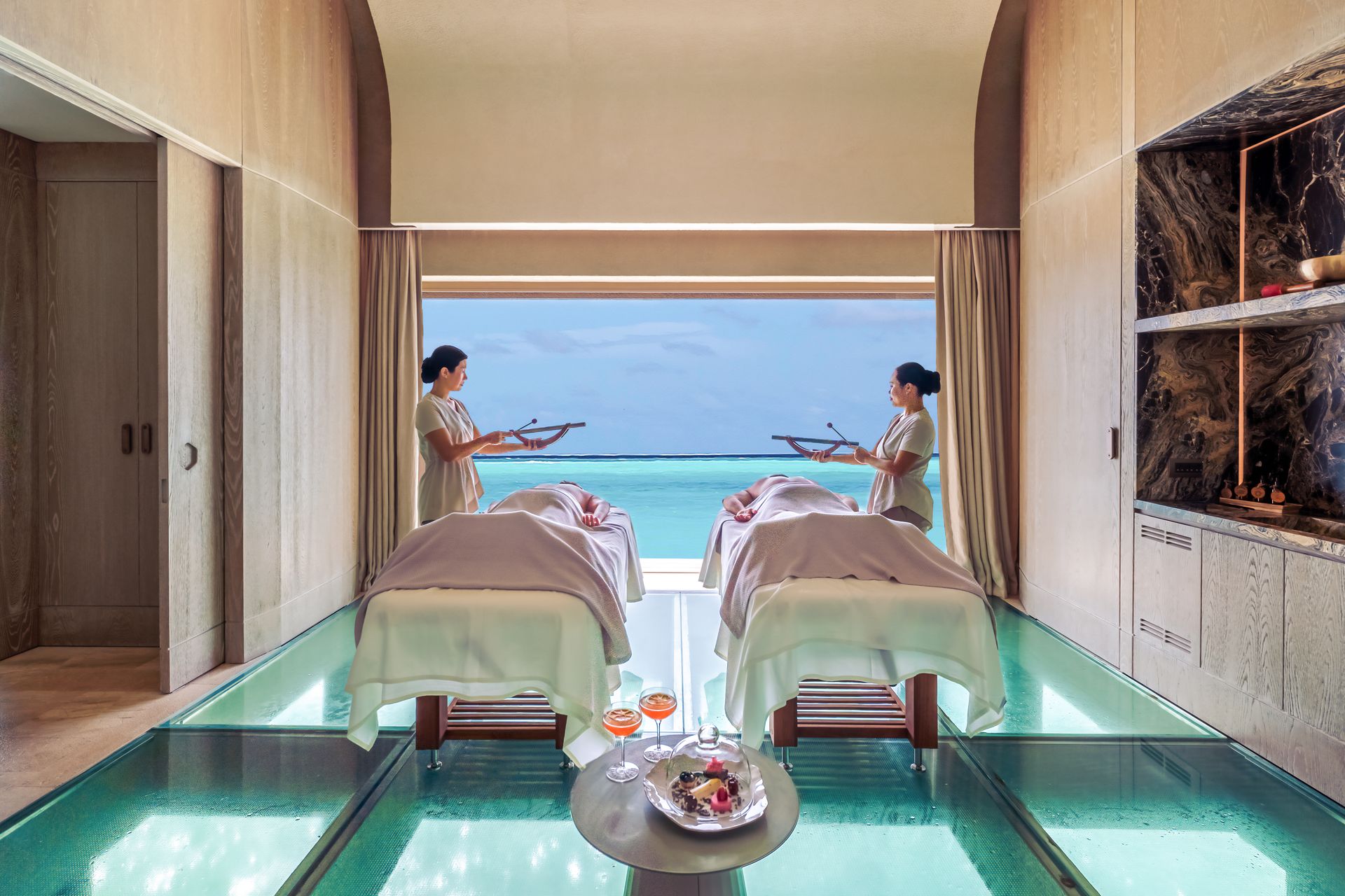 Spa treatment beds overlooking the sea at Joali Being