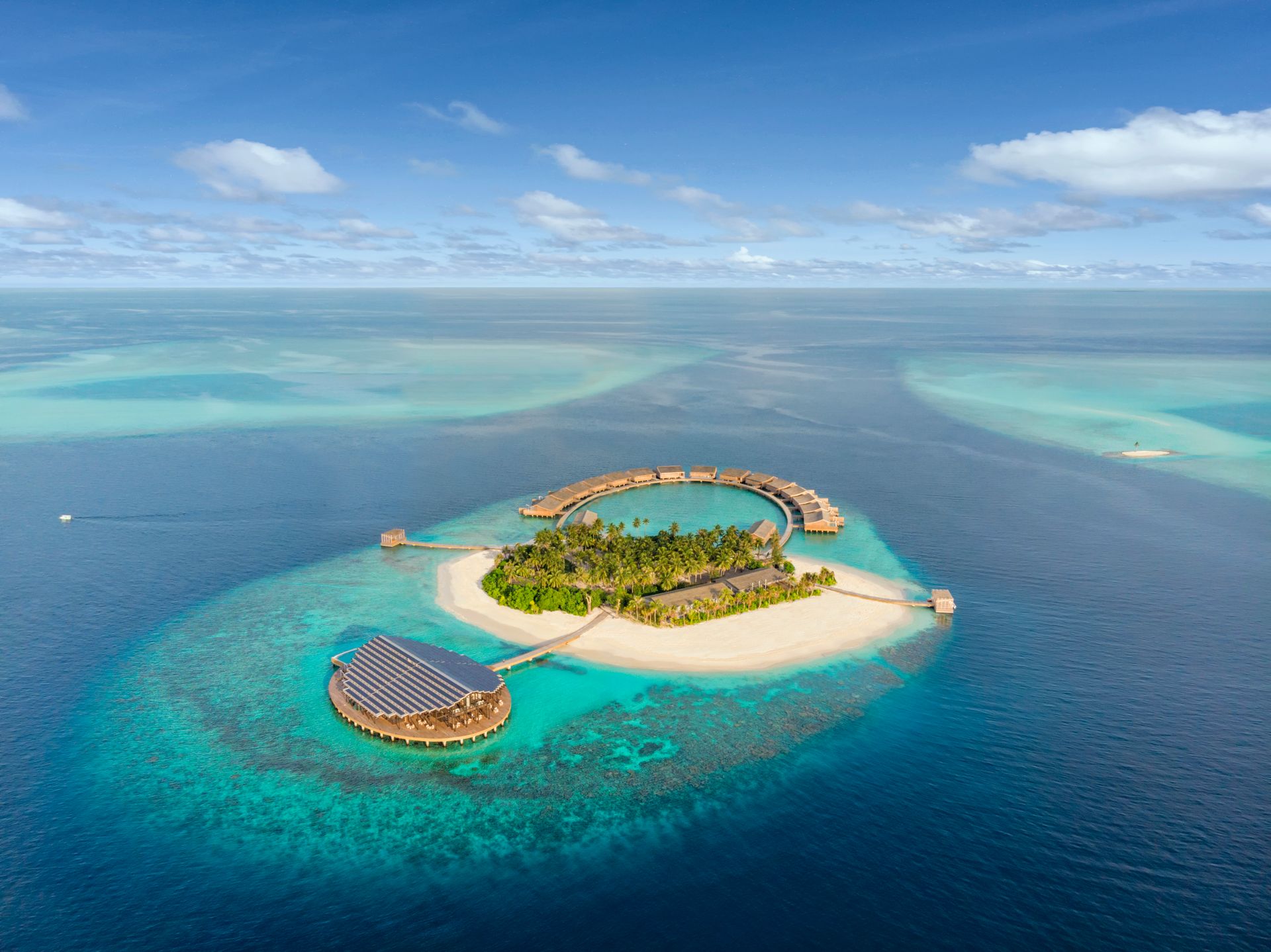 Private island and overwater residences, aerial view at Kudadoo Private Island