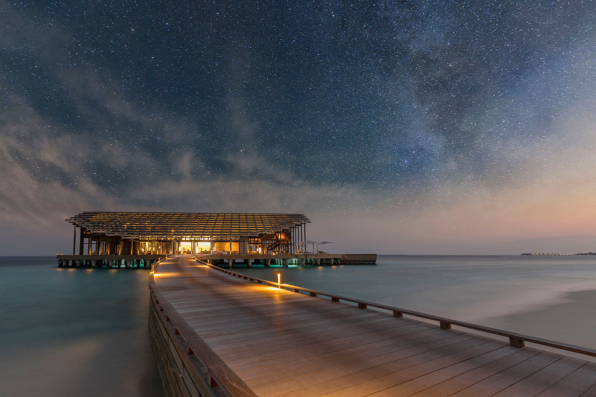 The Retreat beneath a starry sky at Kudadoo Private Island