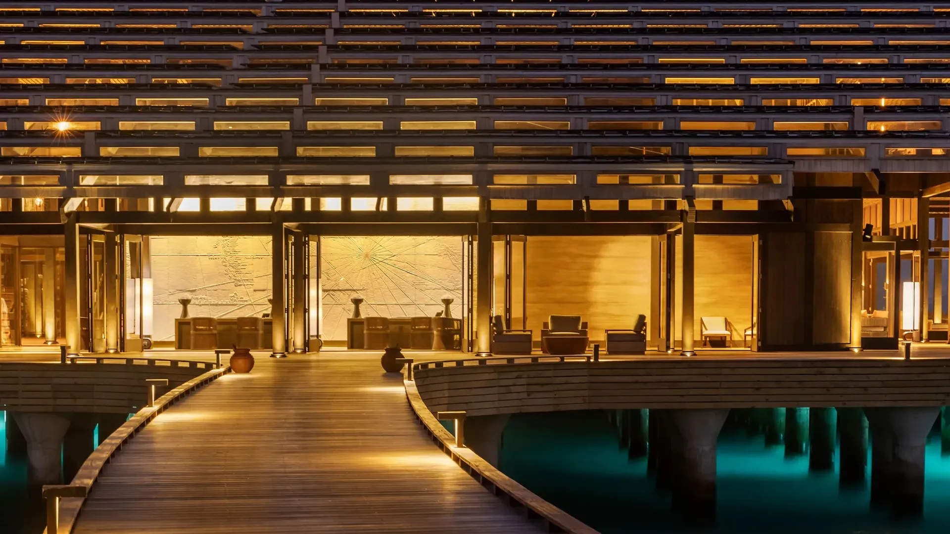 The Retreat entrance at night at Kudadoo Private Island
