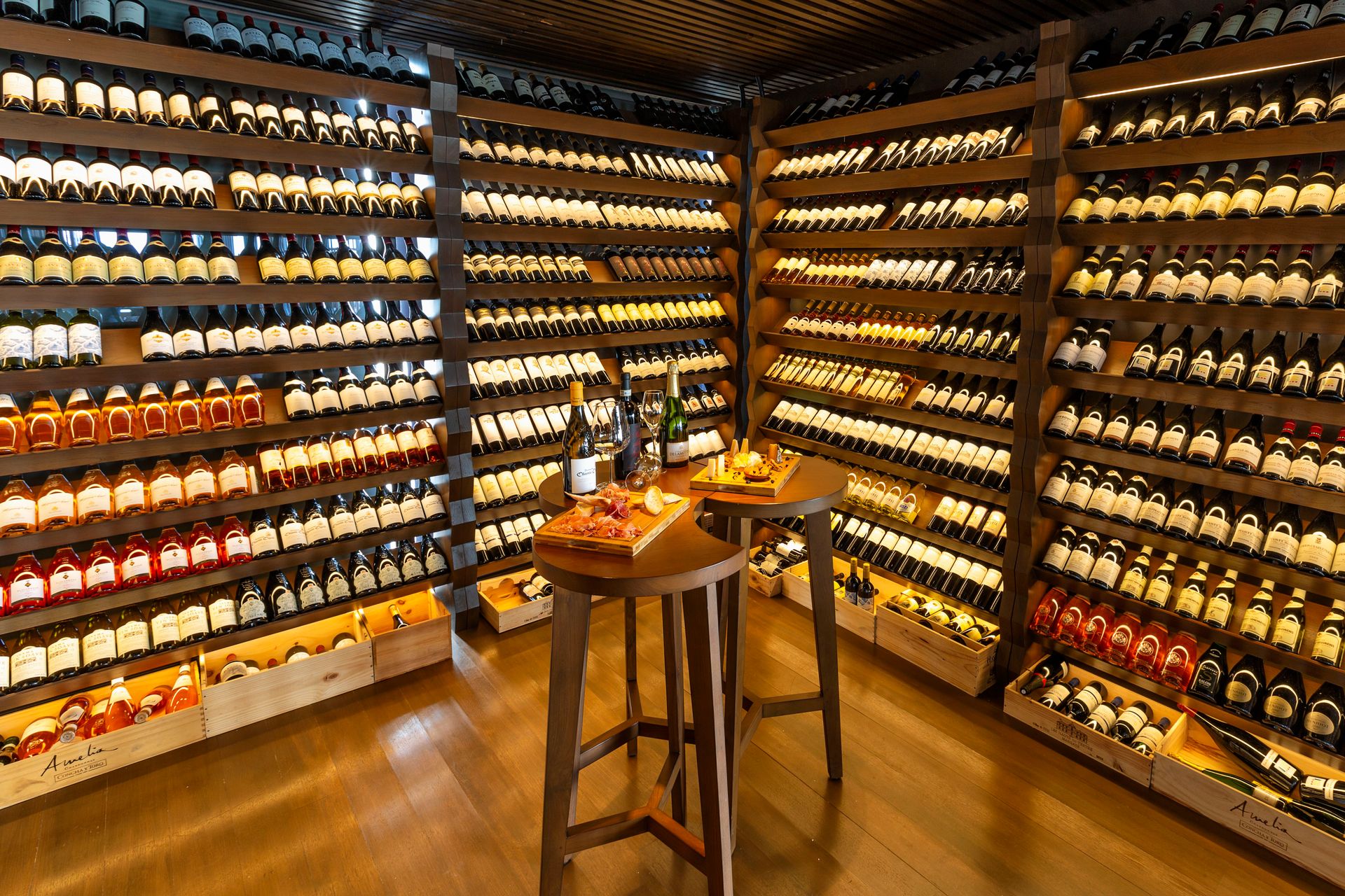 Wine cellar with illuminated bottles at Kudadoo Private Island