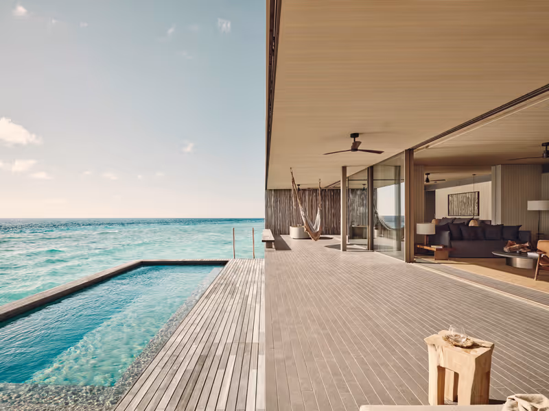 Overwater pool villa and sun terrace at Patina Maldives