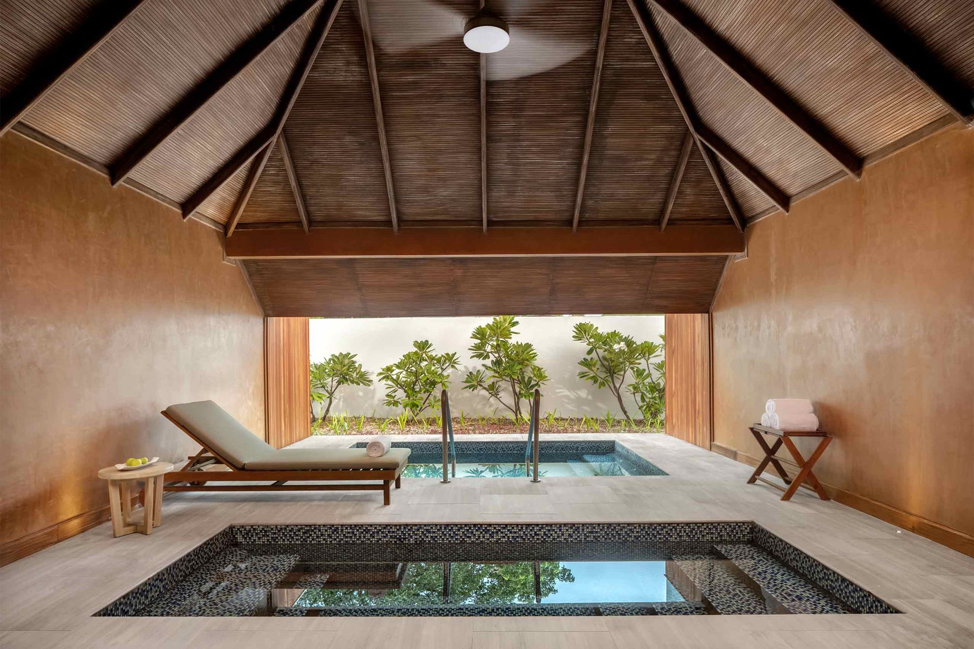 Spa pavilion overlooking a private pool at Six Senses Kanuhura