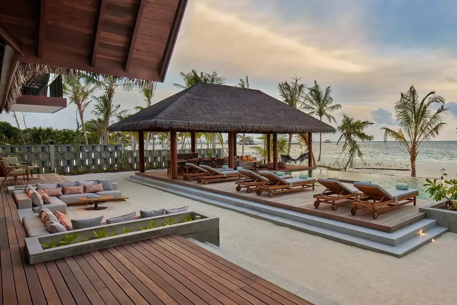 Three-bedroom beach reserve pool terrace at Six Senses Kanuhura