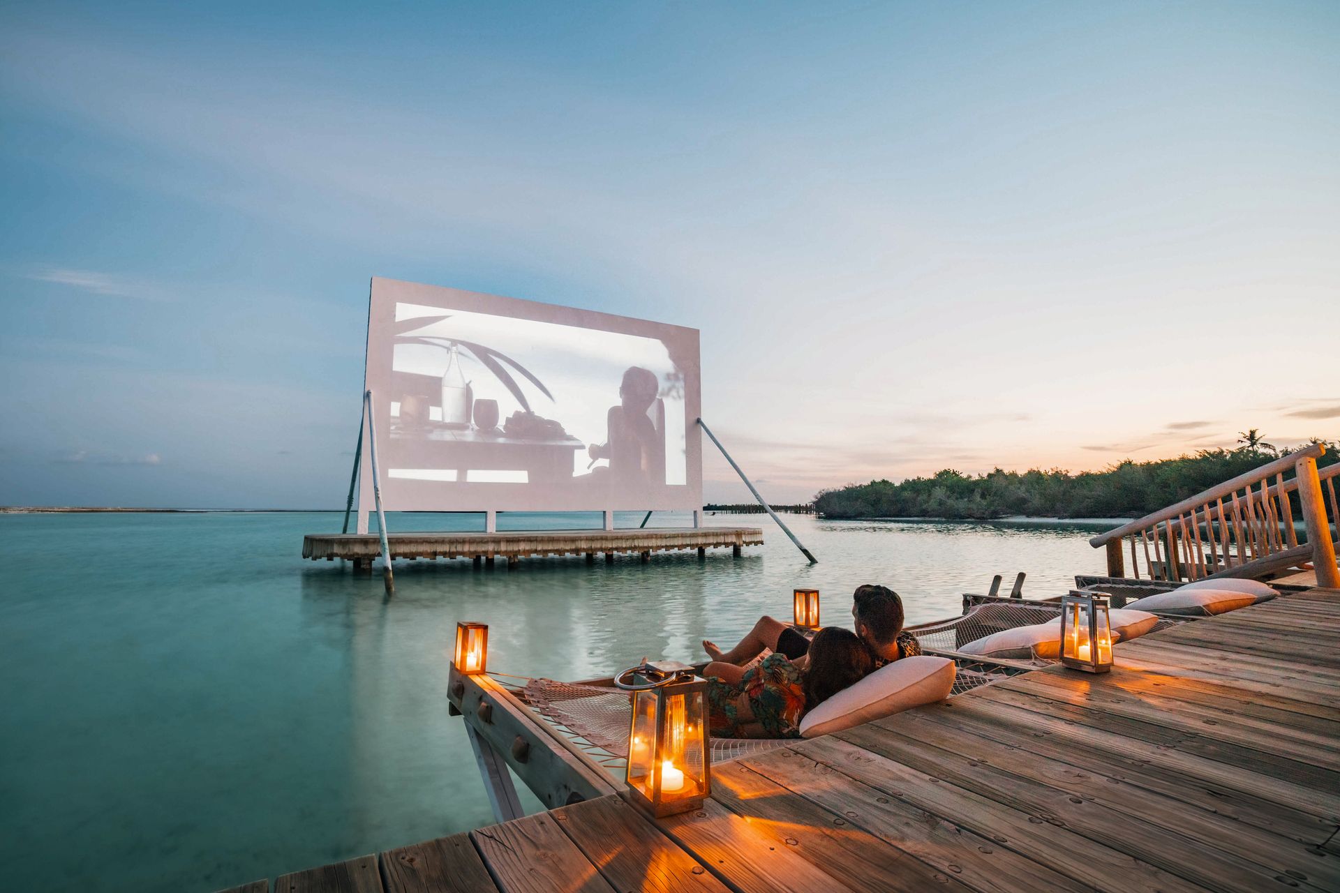 Overwater Cinema Paradiso at dusk at Soneva Jani