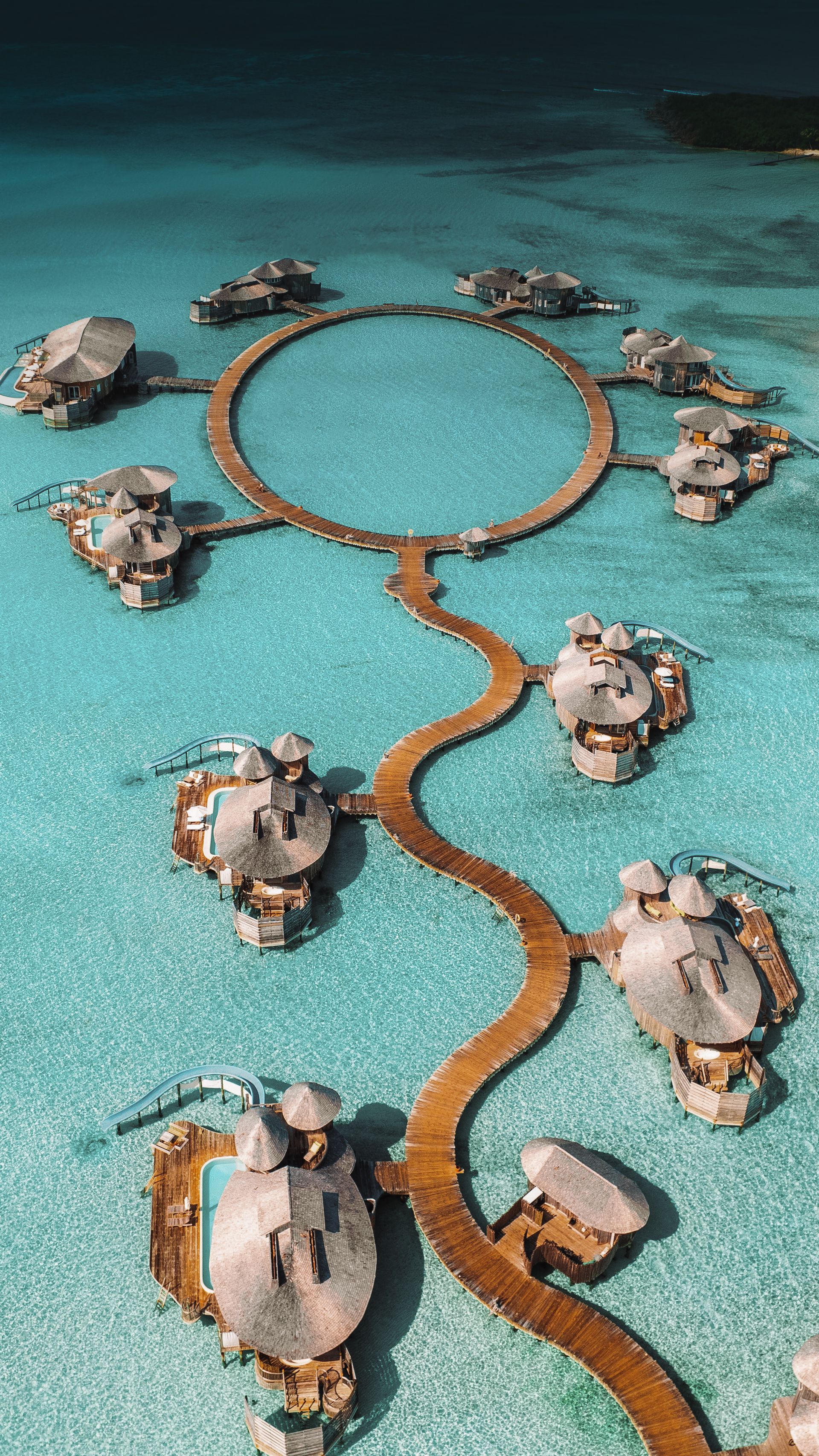 Winding jetties and water villas, overhead view at Soneva Jani