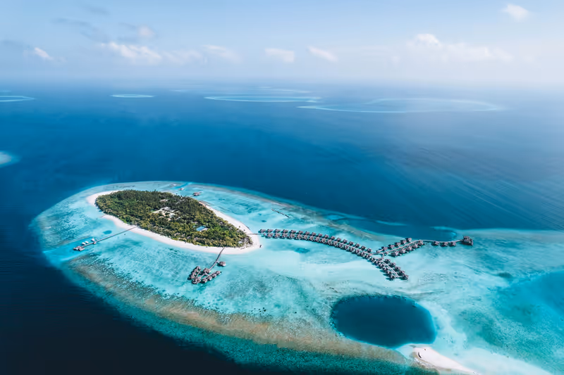 Island and surrounding lagoon, aerial view at Vakkaru Maldives